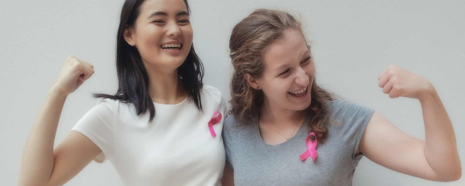 Asian and Caucasian making arm muscles