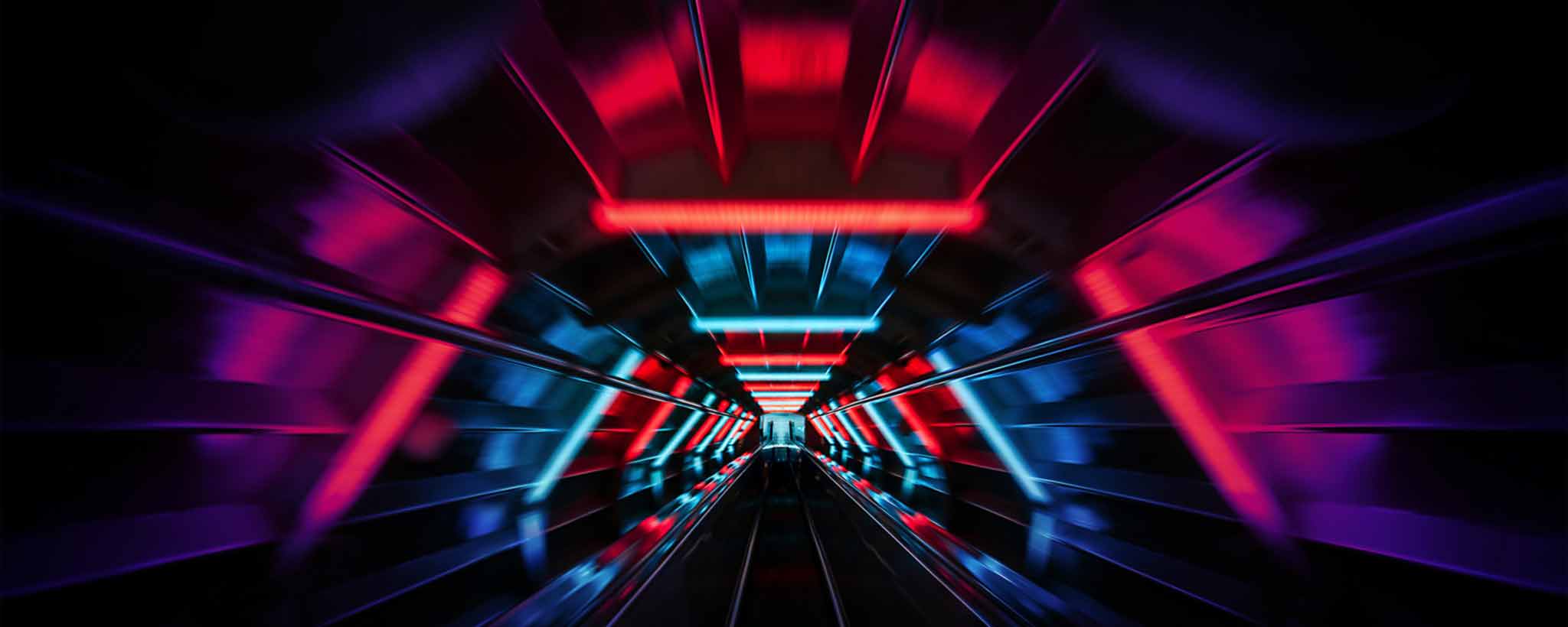'A colorfully lit tunnel.'