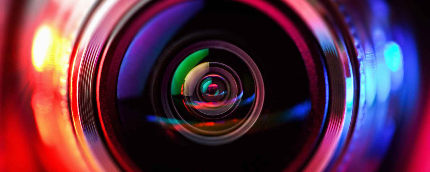 A colorful camera lens closeup.