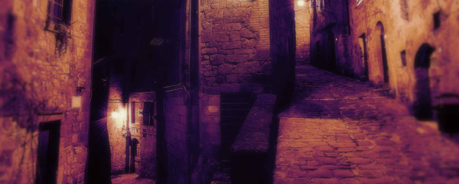 A dark cobblestone street.