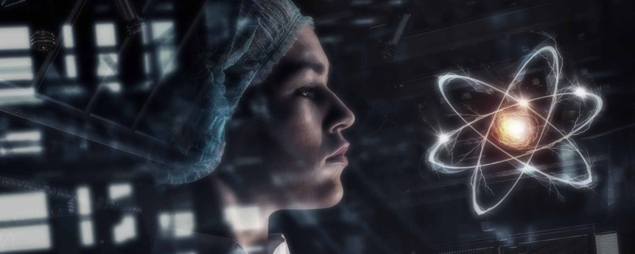 'A female scientist facing a large atom.'
