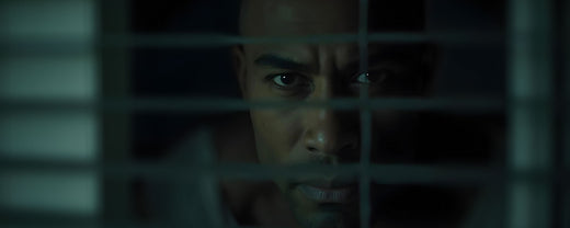 'A menacing man pees through the window blinds. (ai)'
