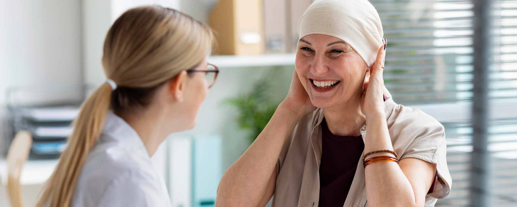 'Smiling female cancer patient'