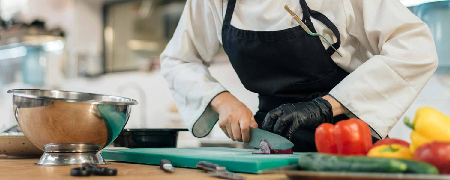 A chef chops vegetables.