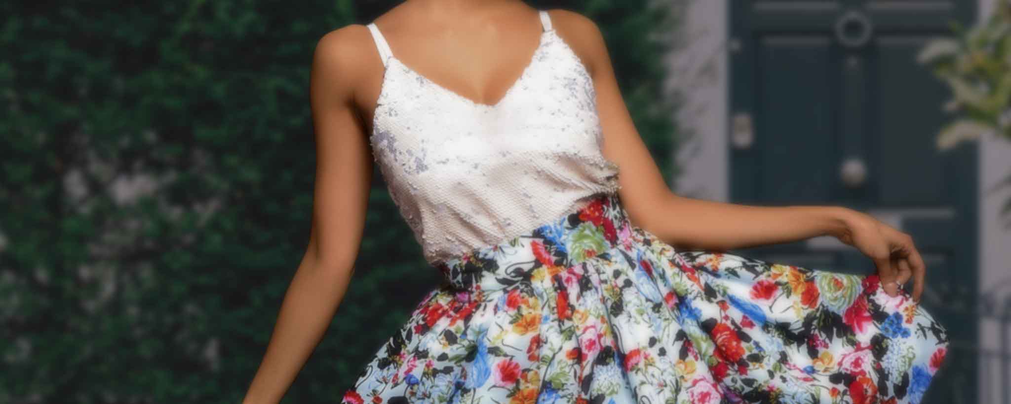 'A female wears a floral skirt.'