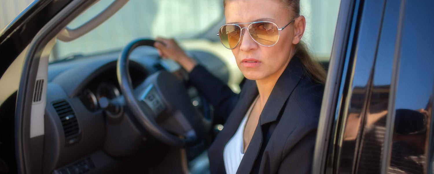 A female patrol officer exiting vehicle.