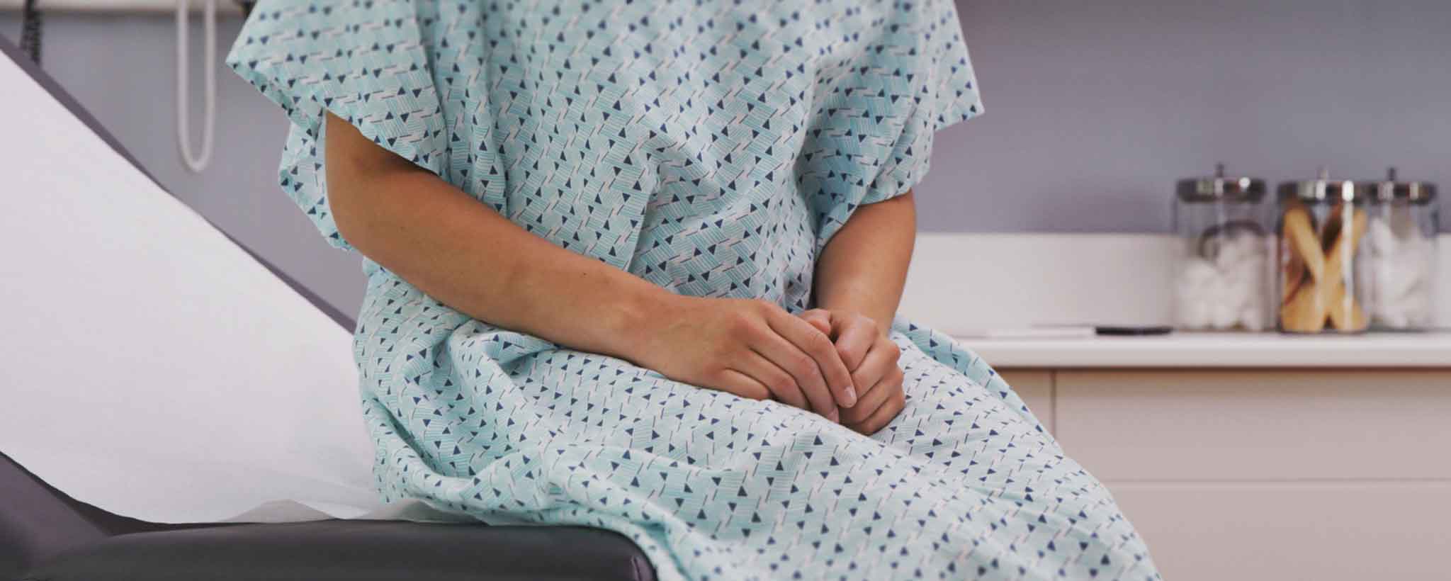 'Female in exam room'
