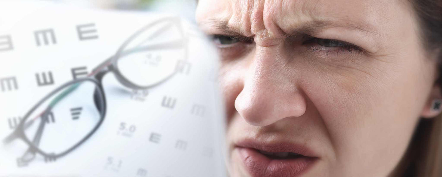 Female squinting to read