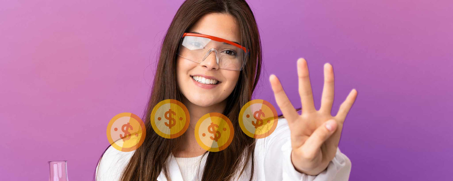 Female scientist holding up four fingers