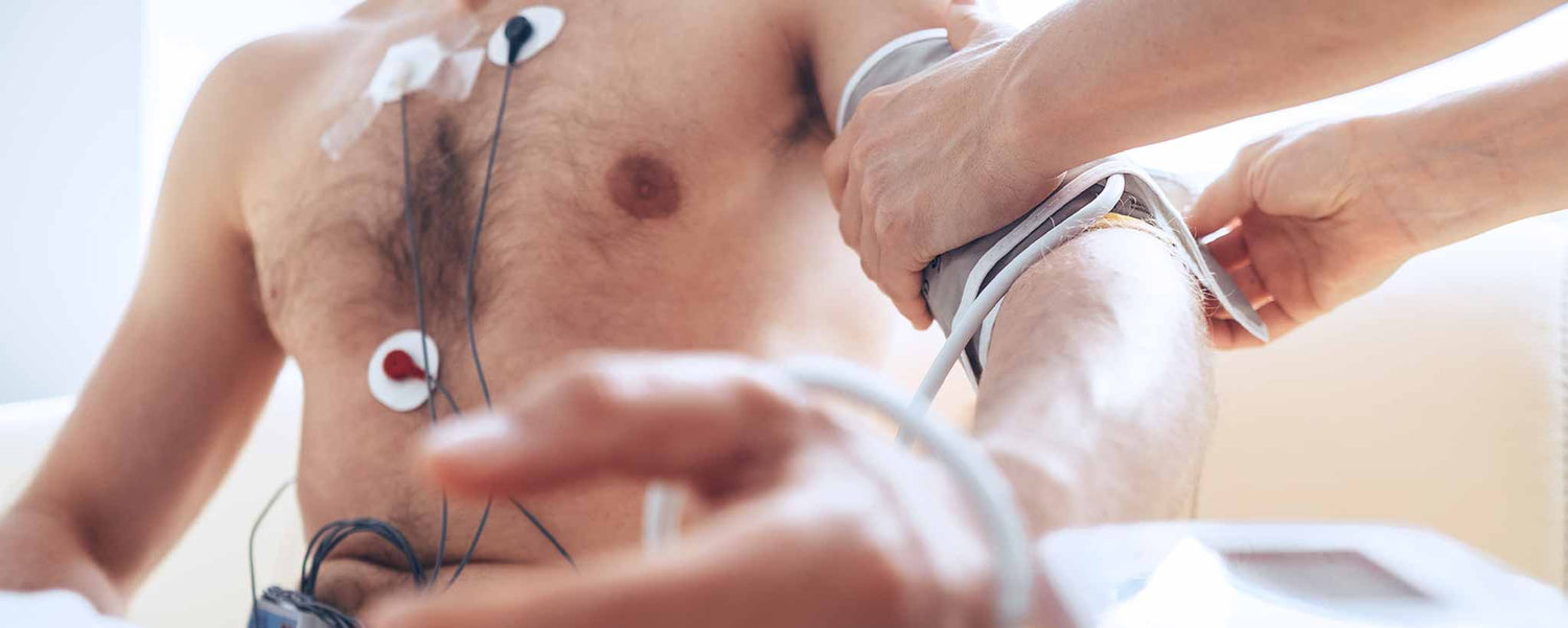 Man having blood pressure checked