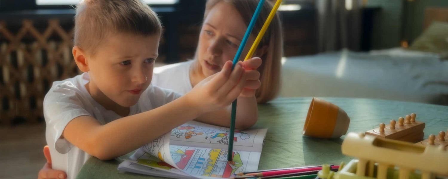 Mother teaching child with Autism