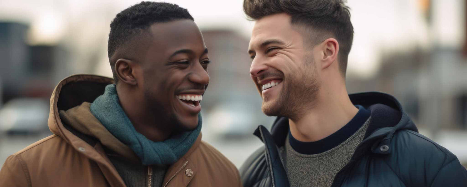Two interracial college male friends smile outdoors. (ai)