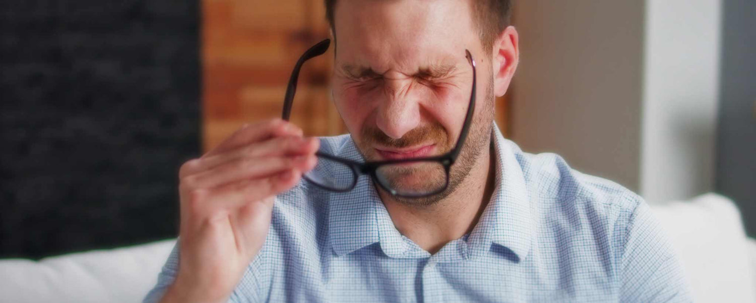 Man with eye fatigue