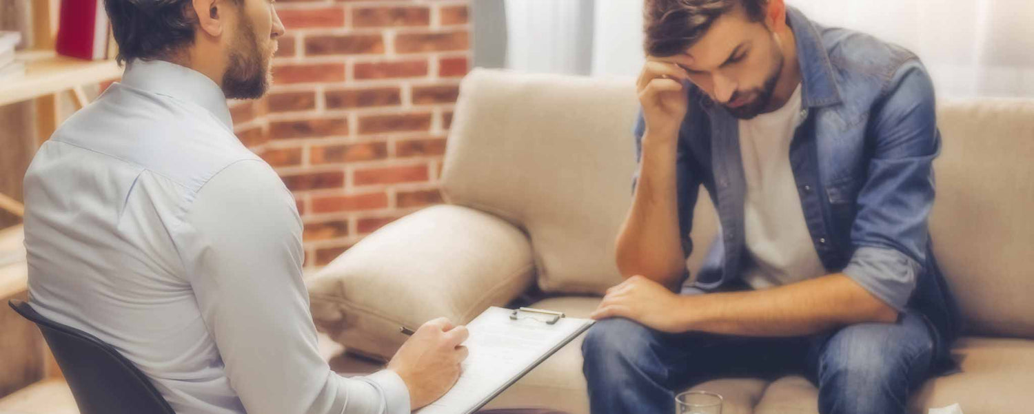 Male receiving psychotherapy