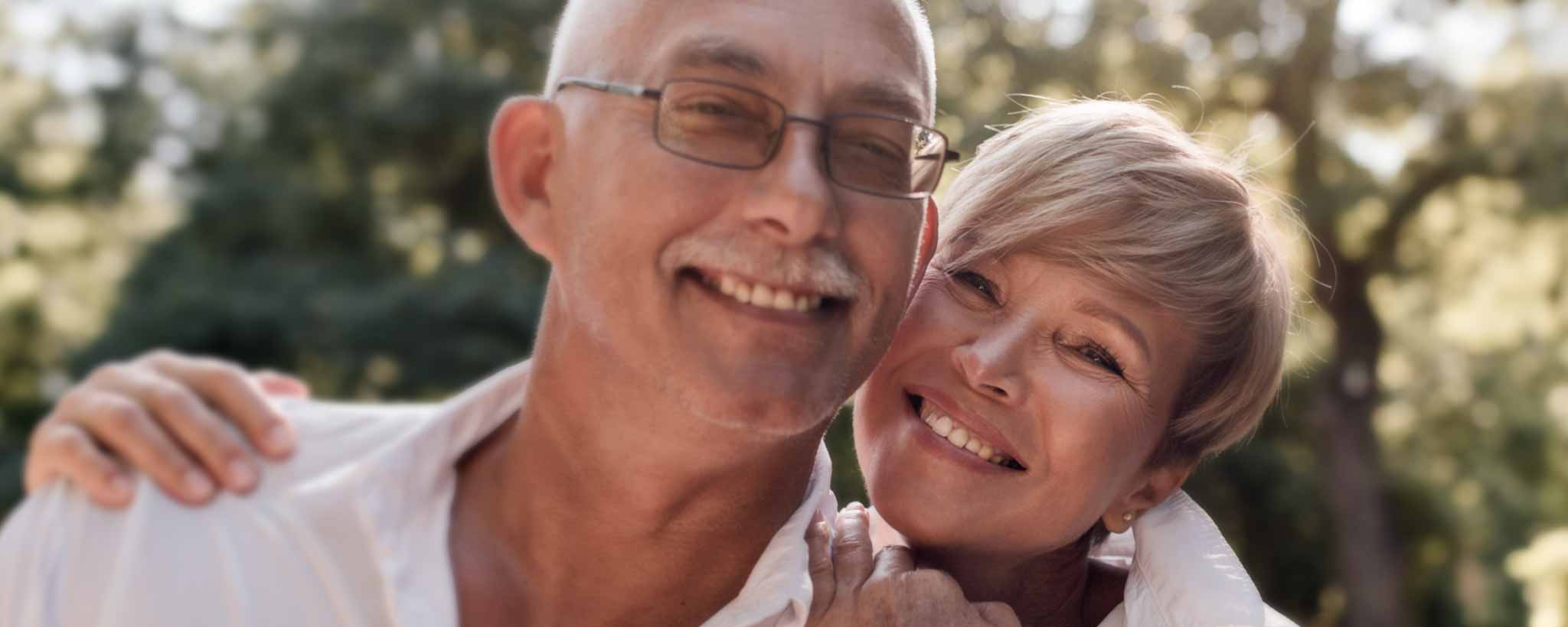 'Mature couple smiling'