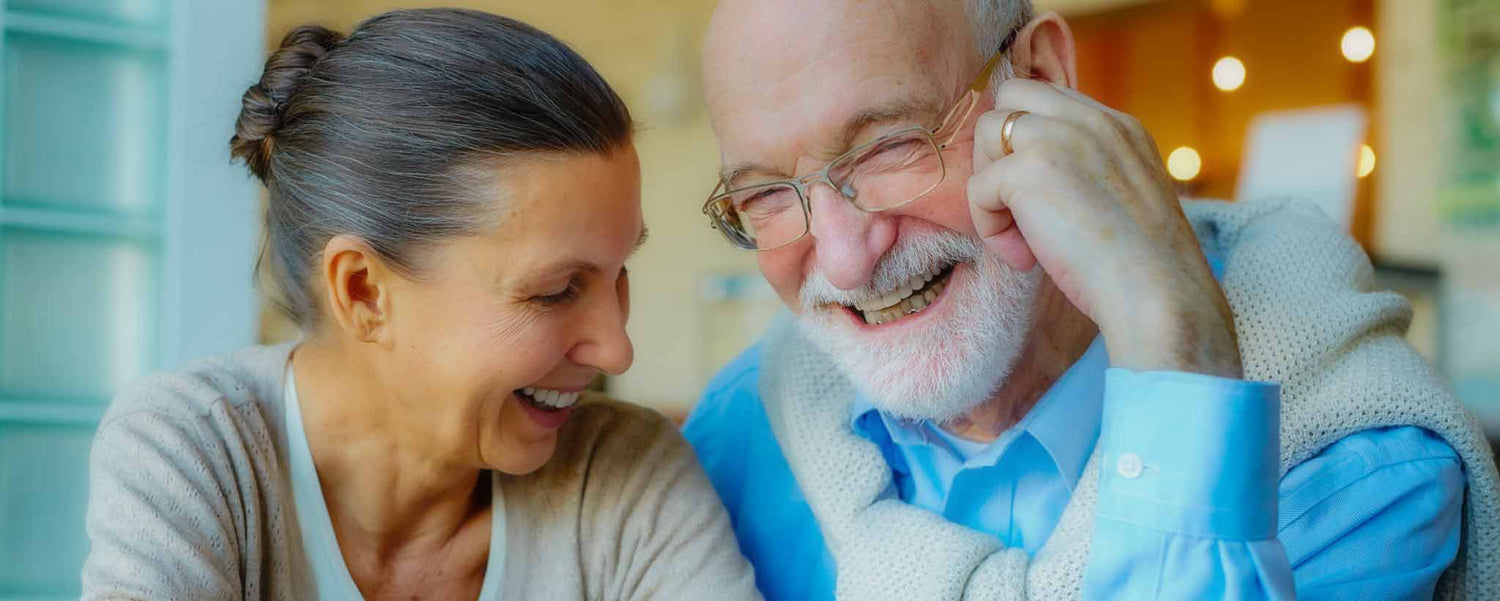 Mature married couple smiling