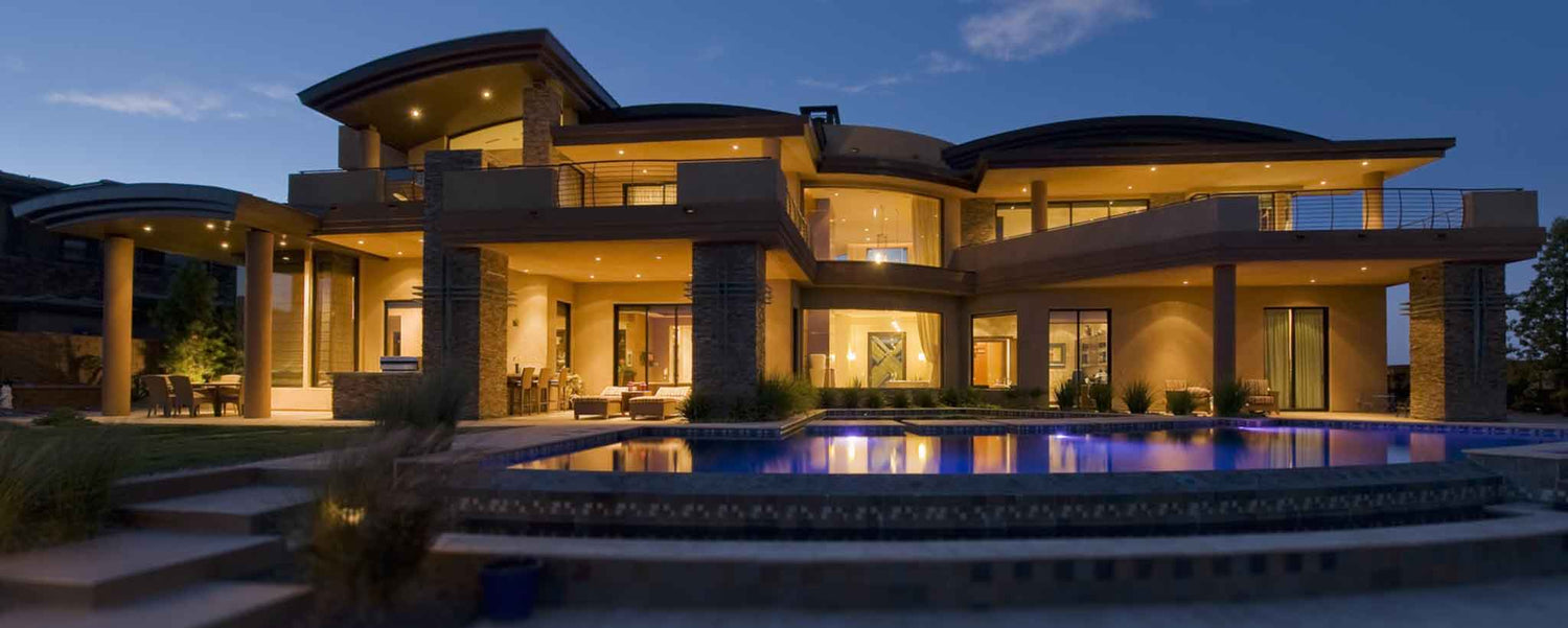 A night-lit mansion.