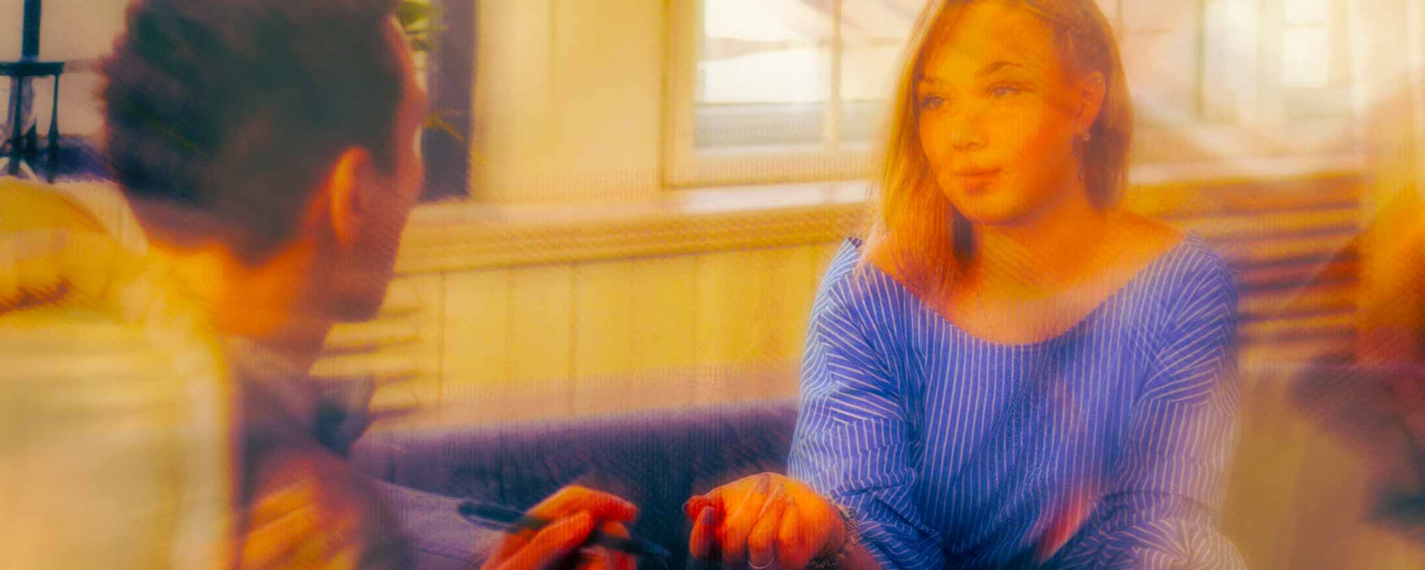 'A psychiatrist session with blonde patient.'