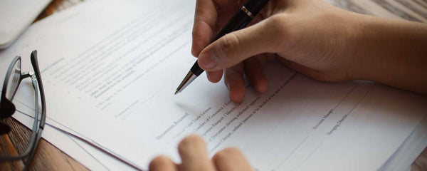 Hand signing contract