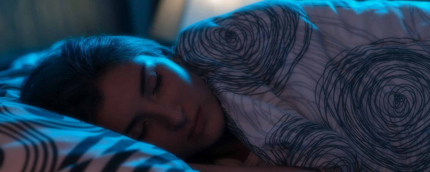 Woman sleeping in bed