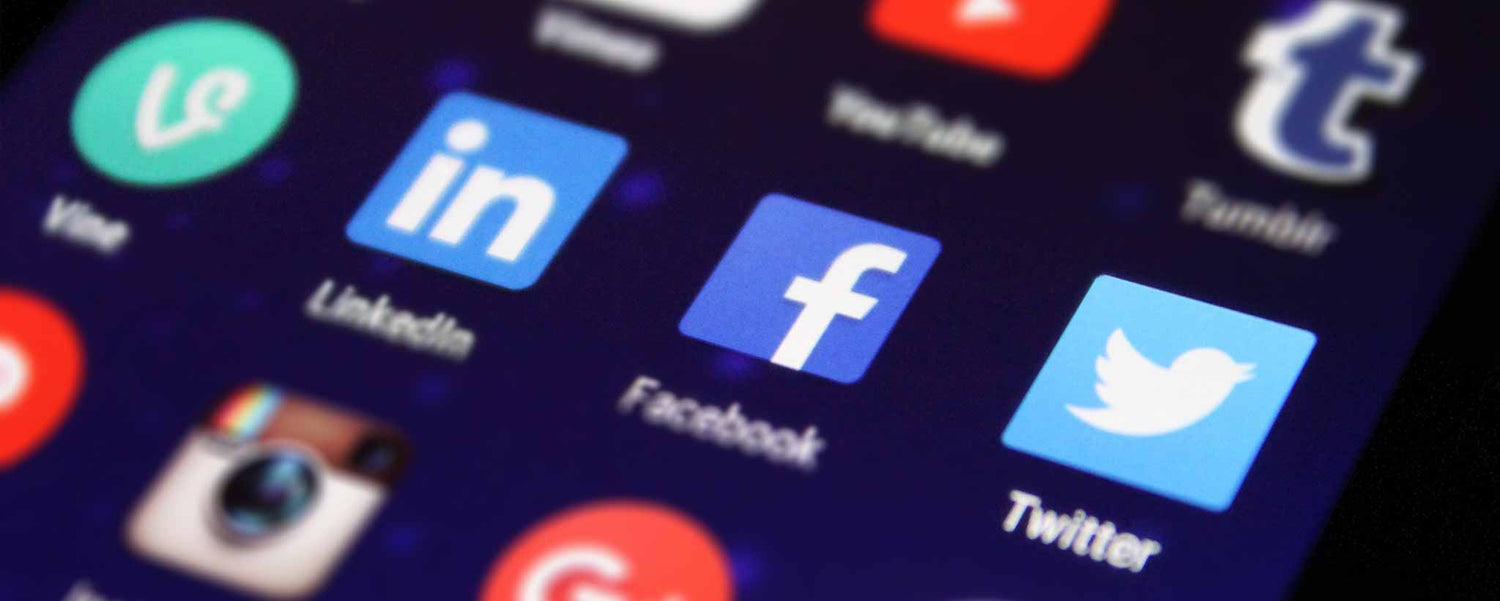 Mobile phone screen with social media icons