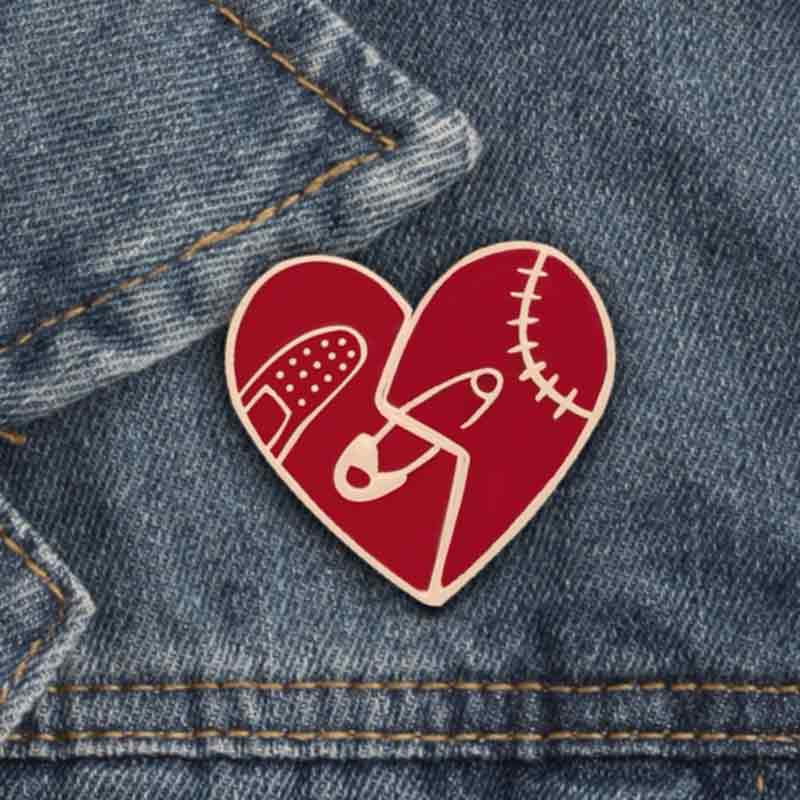 Wearing Mended Broken Heart Lapel Pin