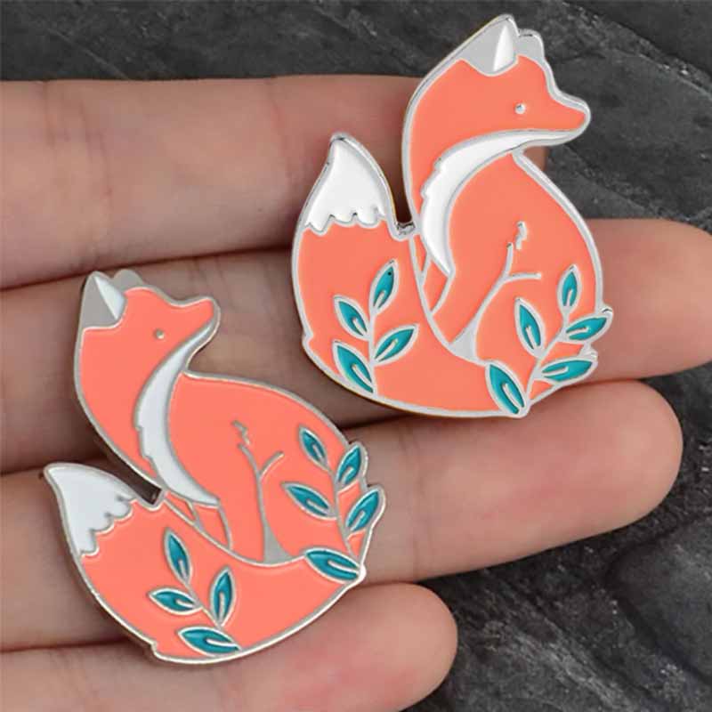 Holding Foxy Orange Lapel Pin