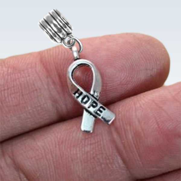 Hope Awareness Ribbon Metal Charm on Fingers