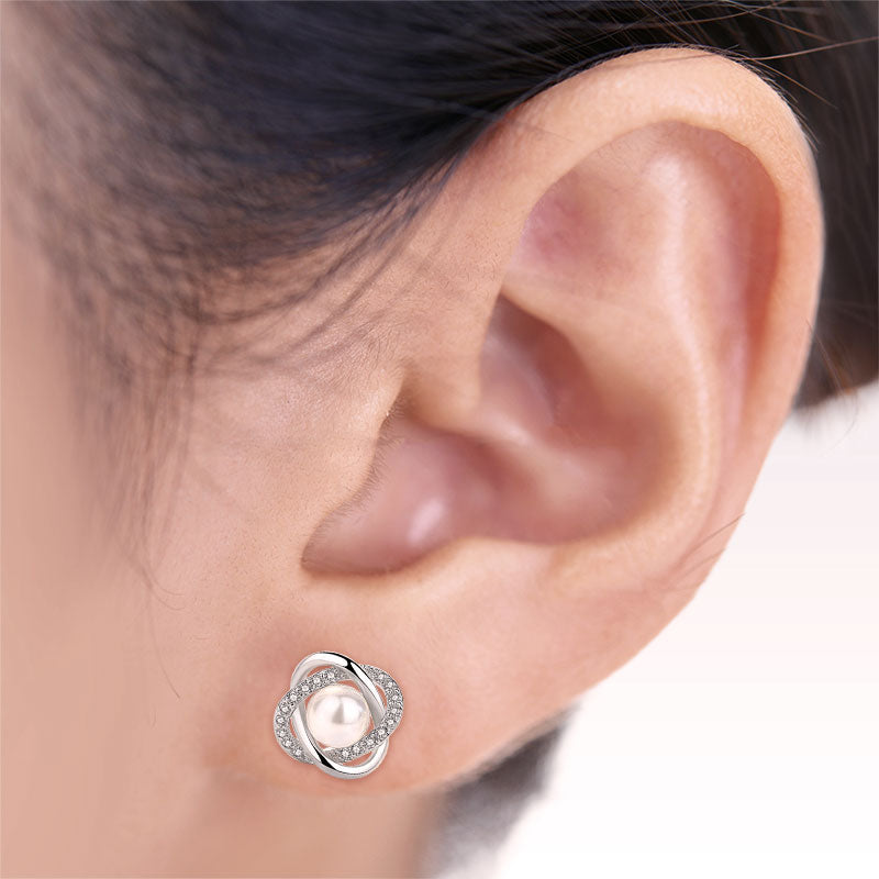 Wearing Pearl Mobius CZ Silver Stud