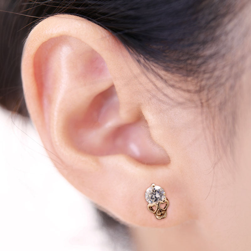 Wearing Gold Skull CZ Earring Stud