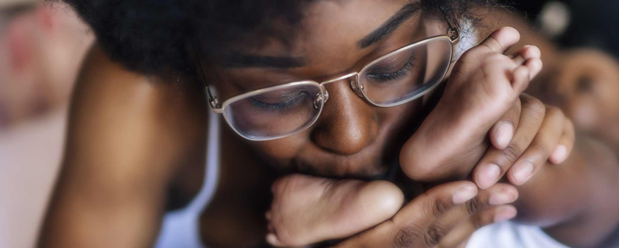 'Black mom kisses child's feet'