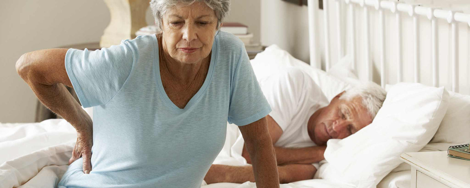 Mature couple with backache