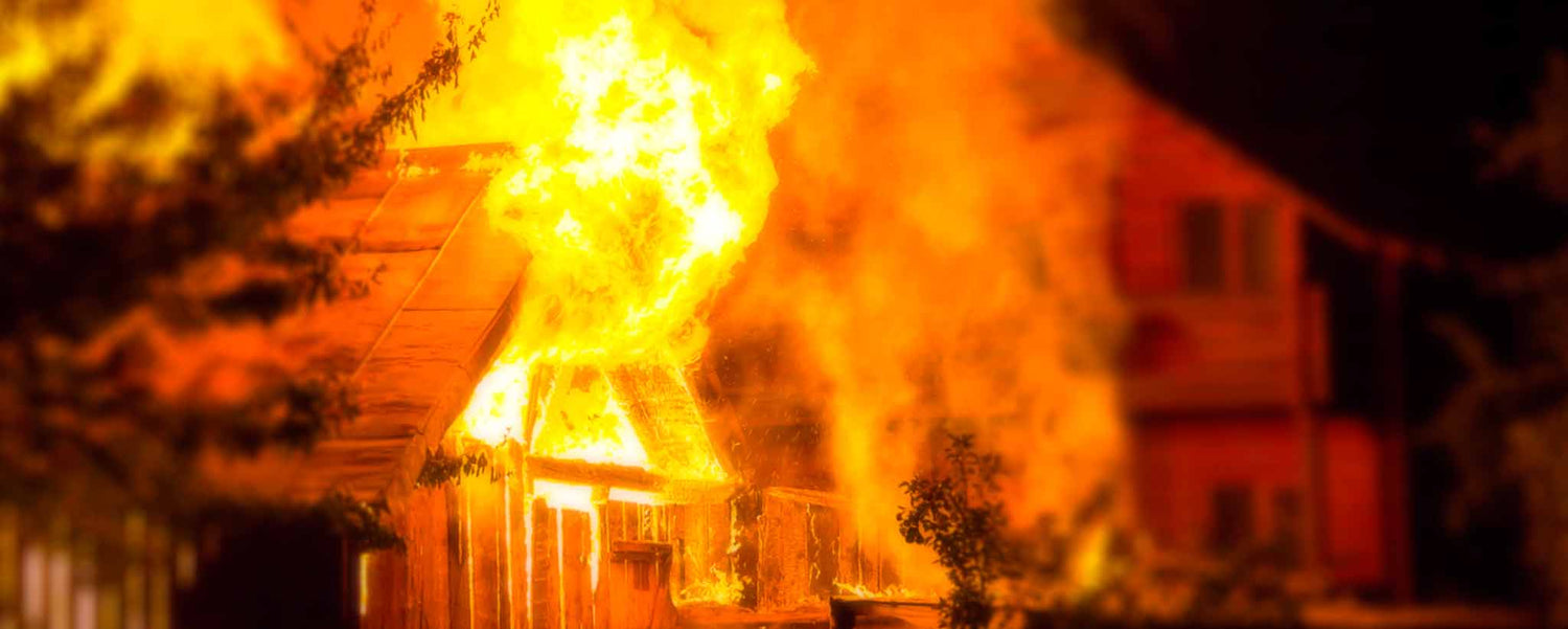 A nighttime burning house.