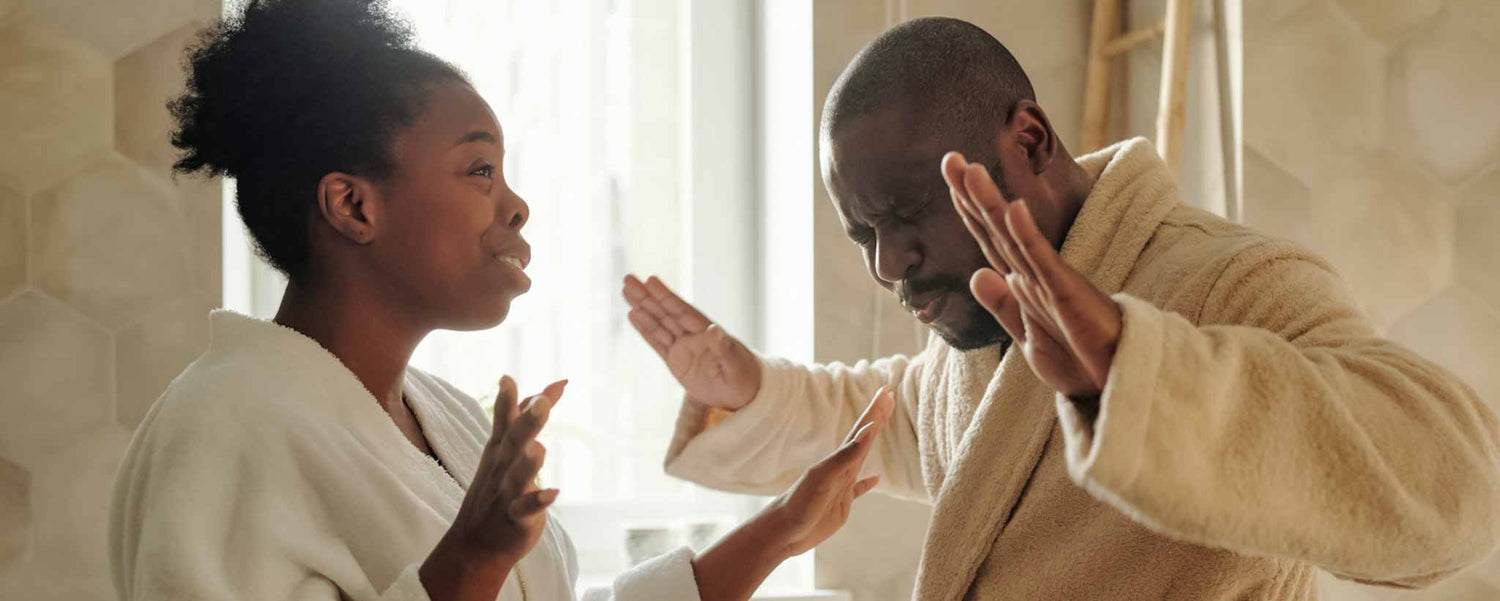 Couple argues in robes