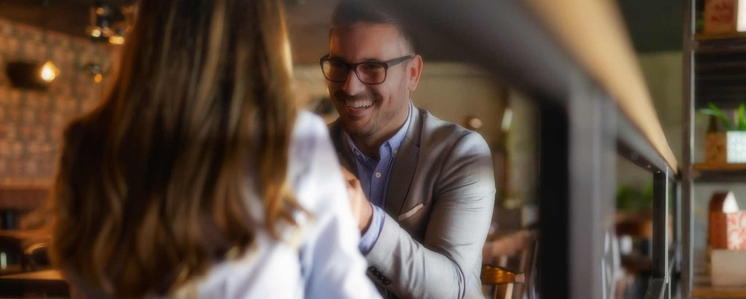 A couple dines at a restaurant.