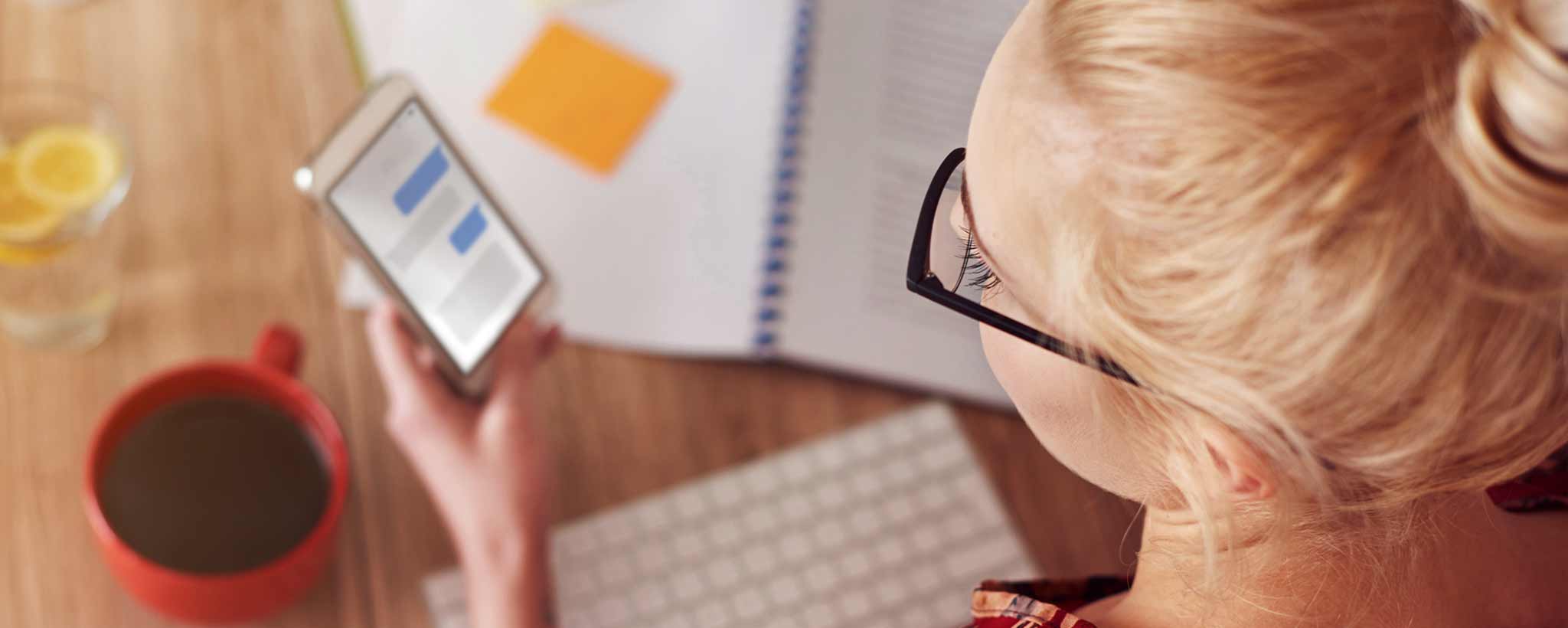 'Woman texting on smartphone'