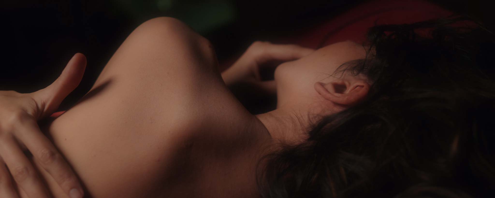 'Man and woman lying together'