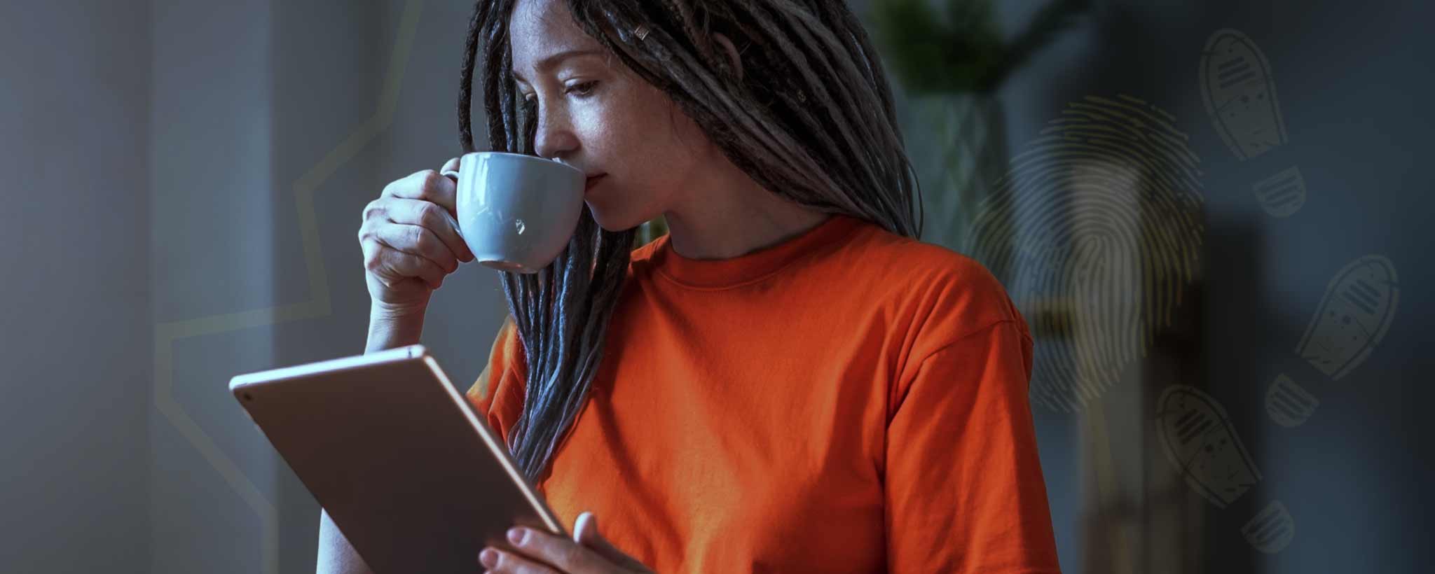 'Young lady reading tablet'