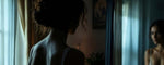 Reyna gazes at her reflection, wondering if she could ever attract a man. (ai)