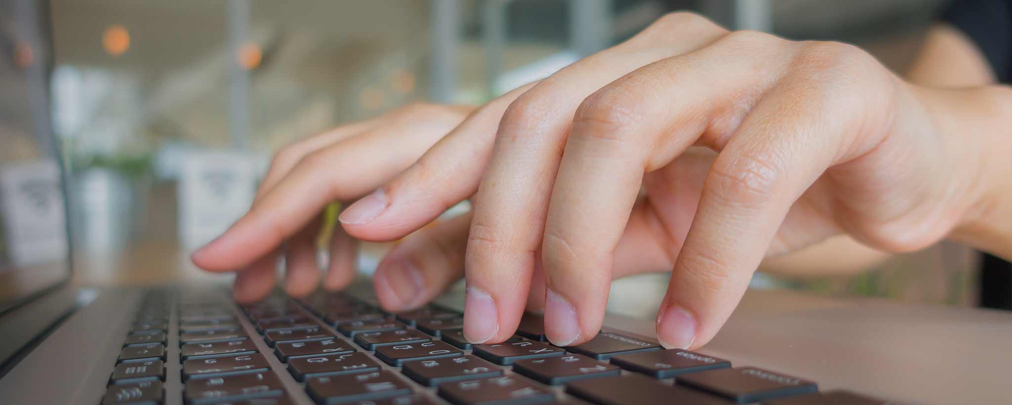 'Caucasian female typing hands. (ai)'