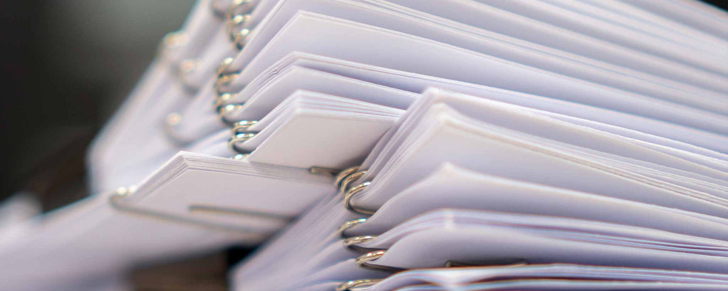 Stack of paper clipped documents