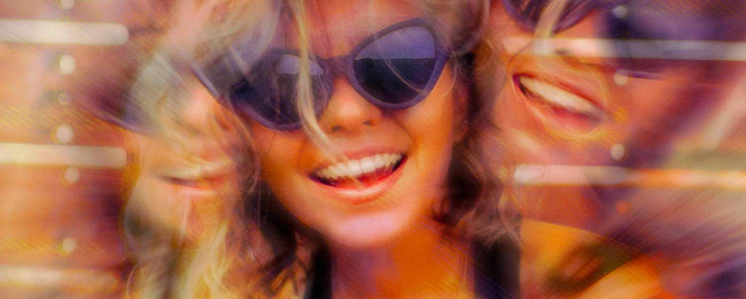 A kaleidoscopic female wearing sunglasses.