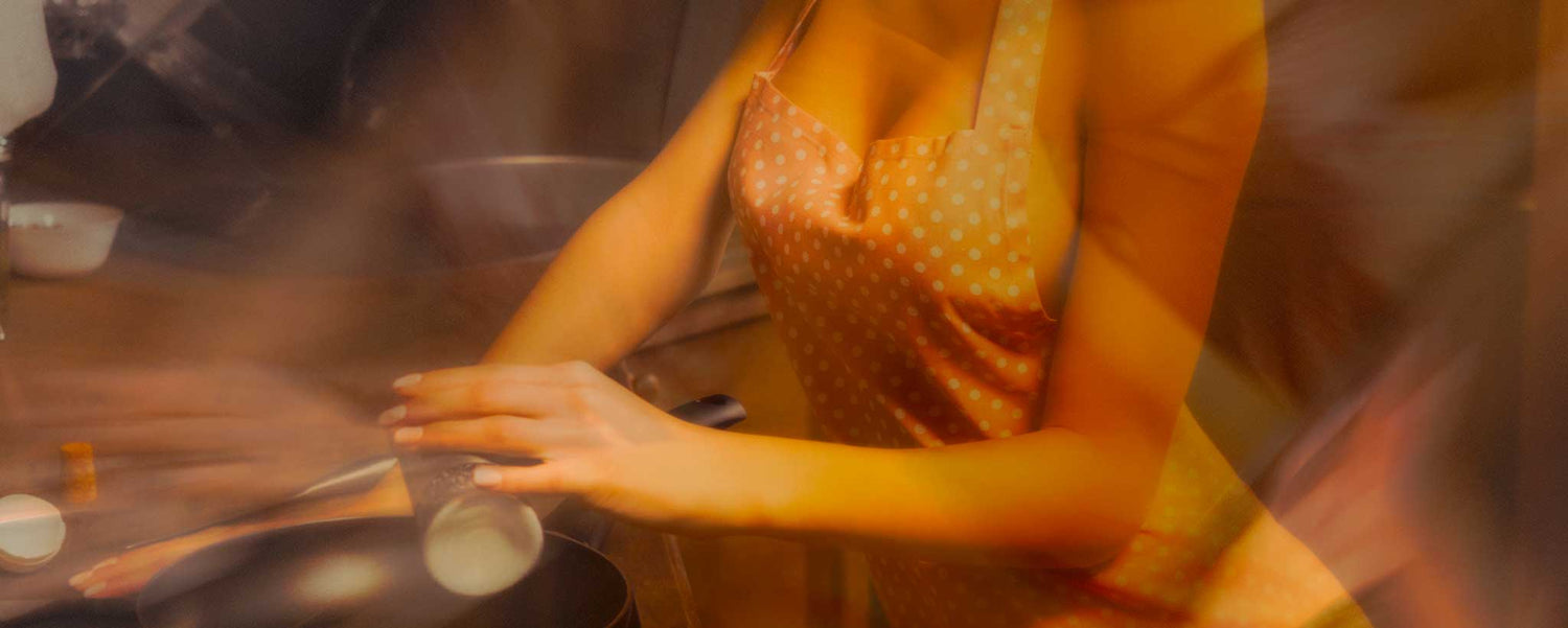 A prism effect of a lady cooking.