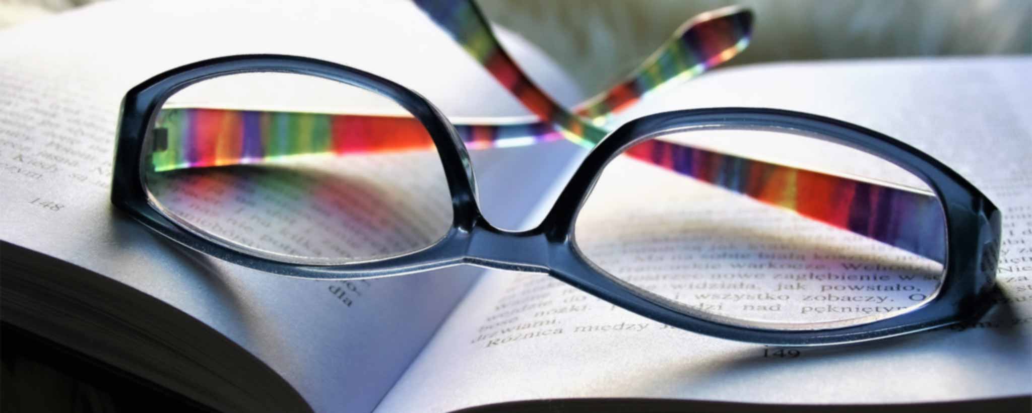 'Reading eyeglasses on book'