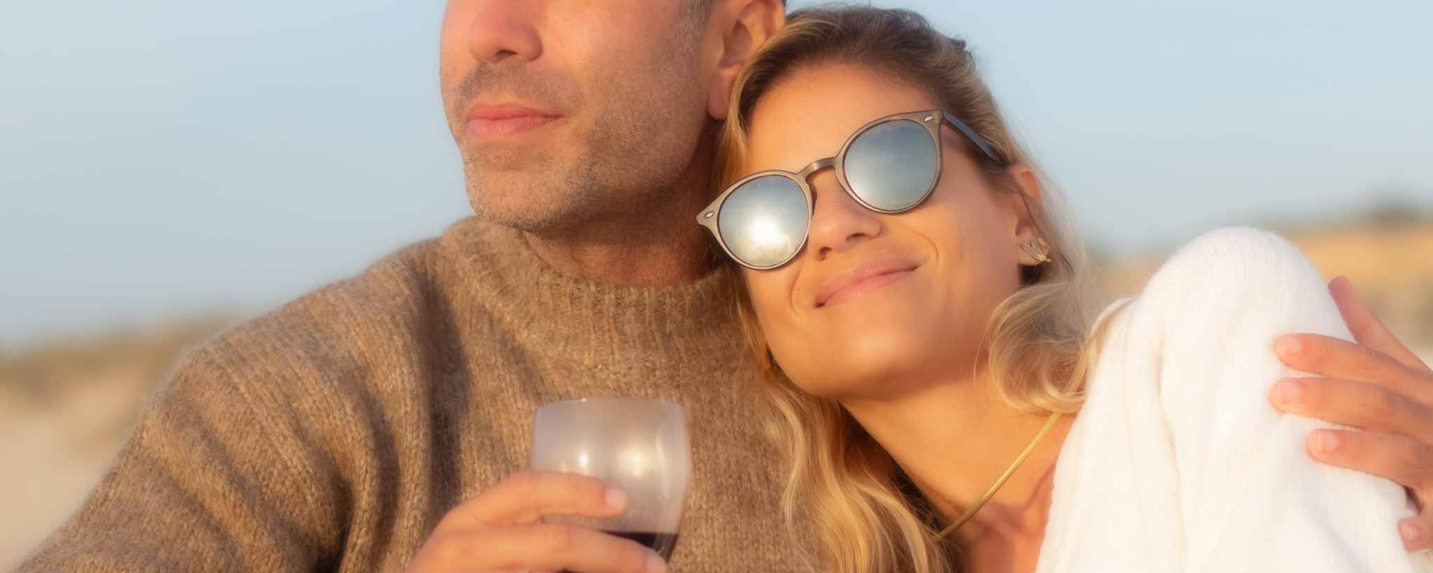 'Couple relaxing on beach'