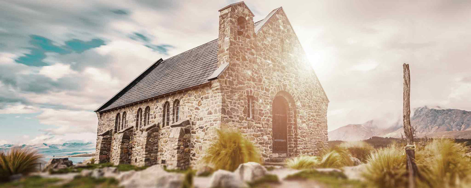 A hilltop rural brick church on the sunlight.