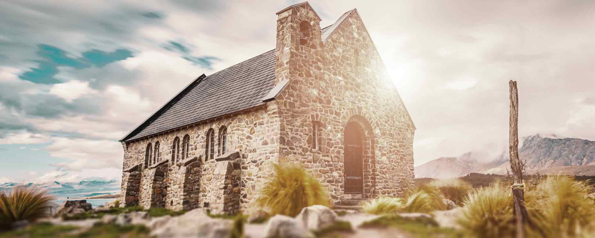 'A hilltop rural brick church on the sunlight.'