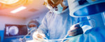 A doctor performs surgery in an operating room.