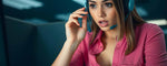 A female wears call-center headphones. (ai)