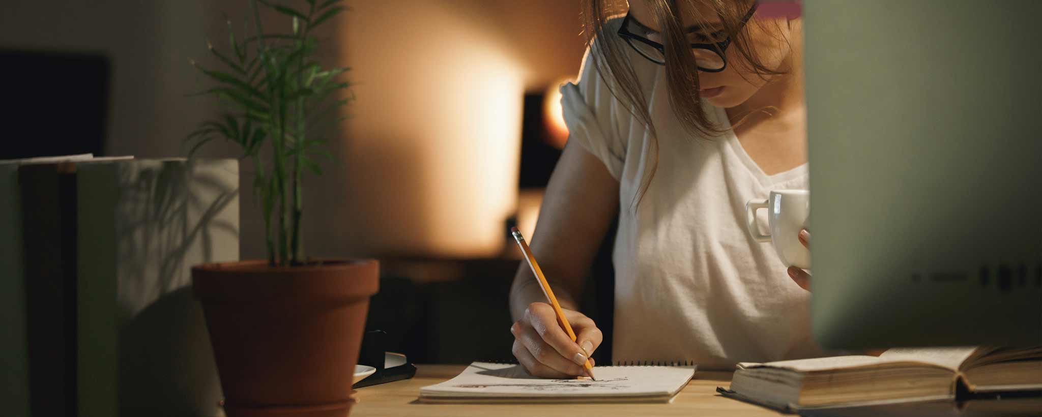 'Young woman writing'